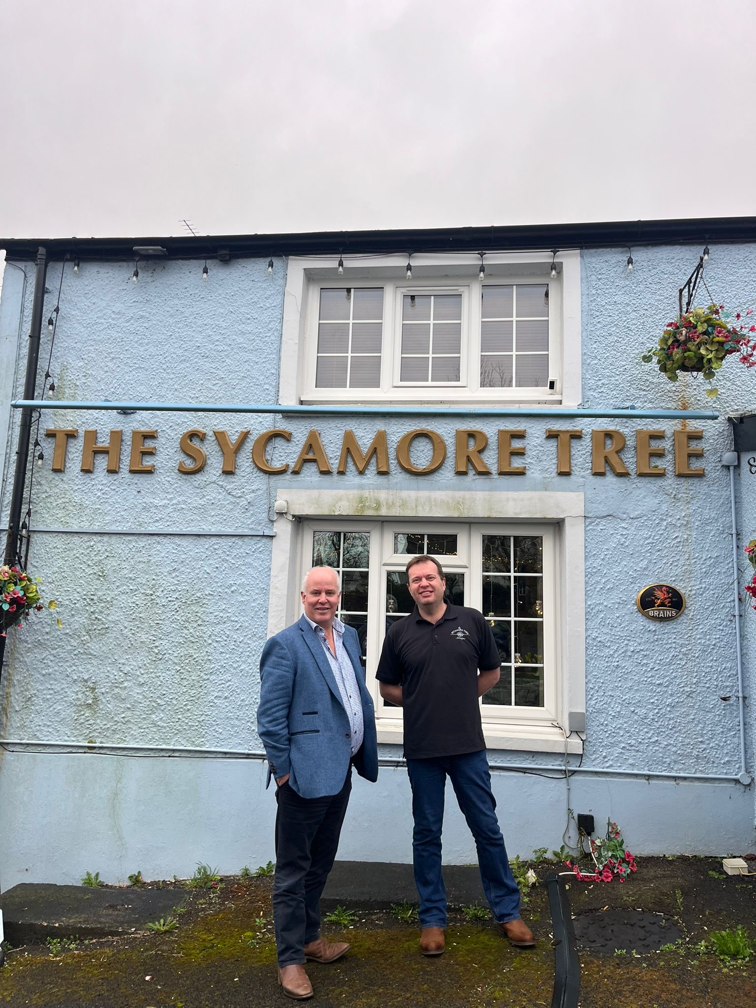 Andrew RT Davies with Mark Davies, pub landlord, outside his pub, The Sycamore Tree, Colwinston